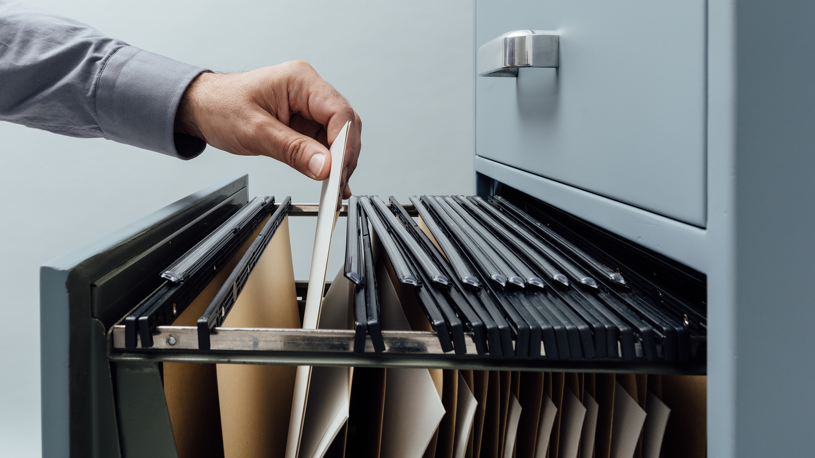 Office Clerk Searching For Files
